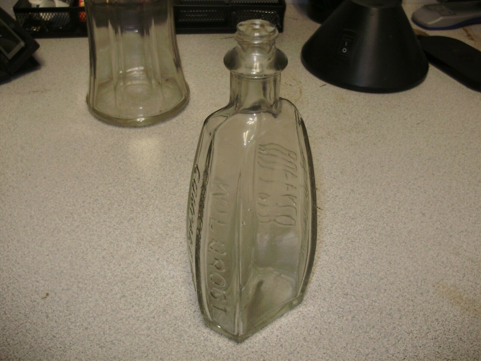 Antique Wild Root Glass Barber Bottle
